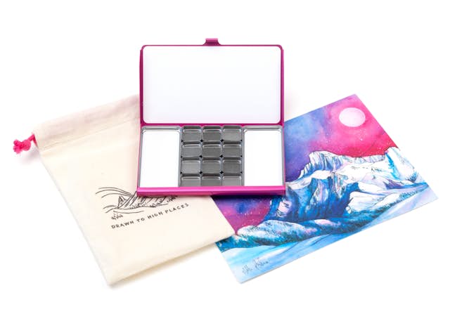 The Drawn to High Places Palette shown with drawstring bag and promotional card.