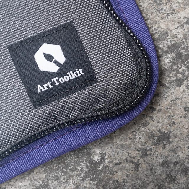 Detail view of the purple Art Toolkit cover.